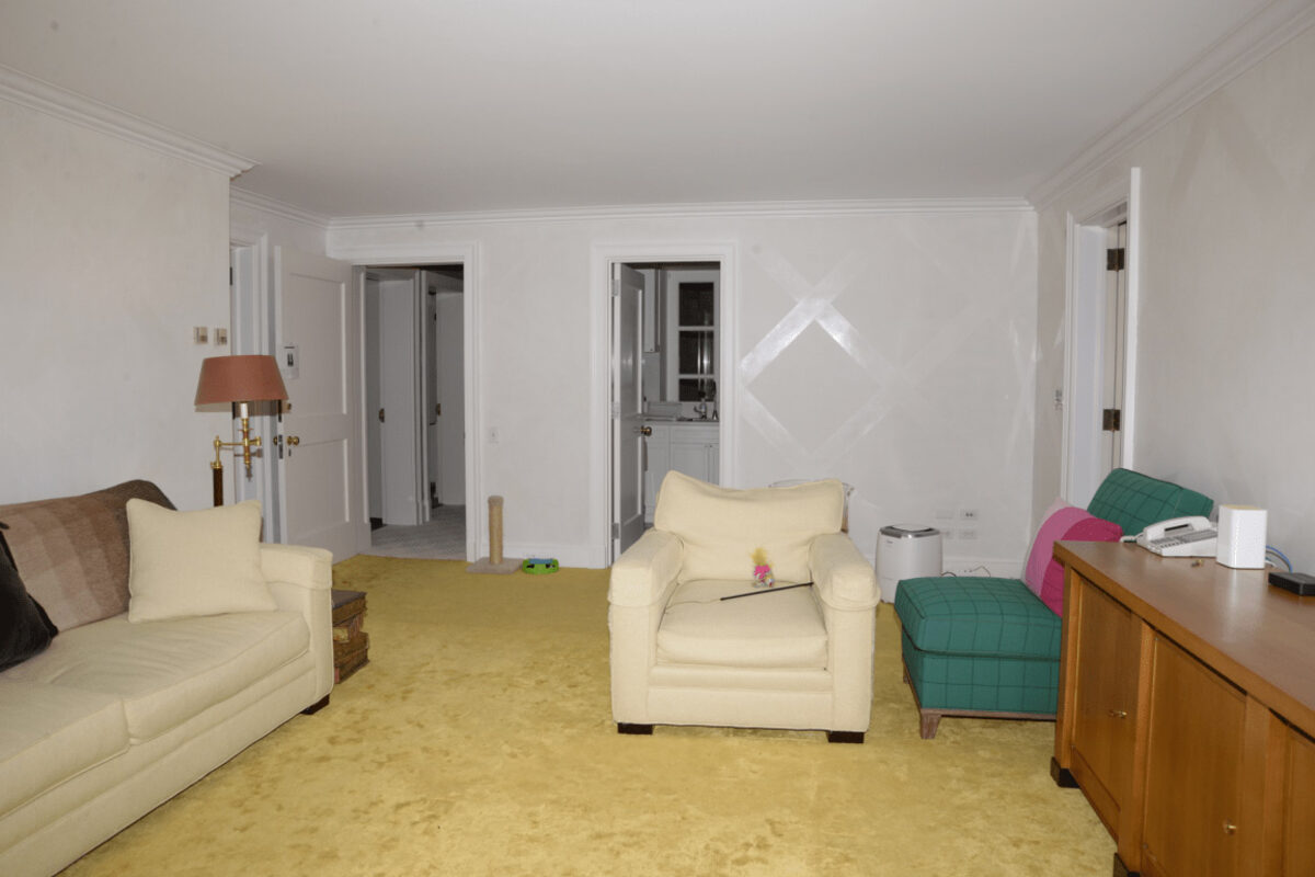 Cream sofa and armchair in a bright living room